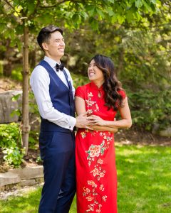 Bride and groom laughing after Chinese wedding door games