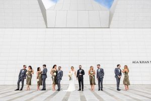 Joyful wedding party at Aga Khan Museum during a wedding photoshoot in Toronto