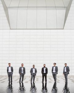 Stylish groomsmen at Aga Khan Museum during a wedding photoshoot in Toronto
